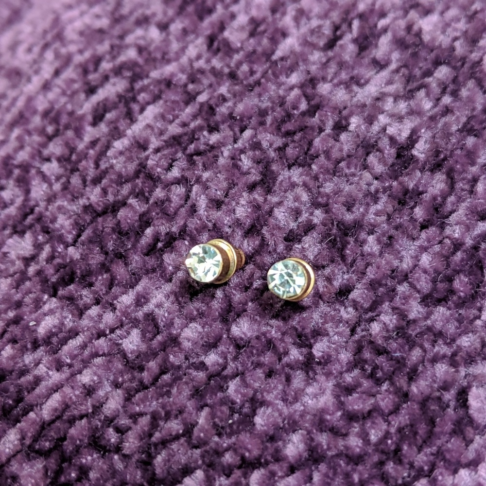 Gold earrings with white stones